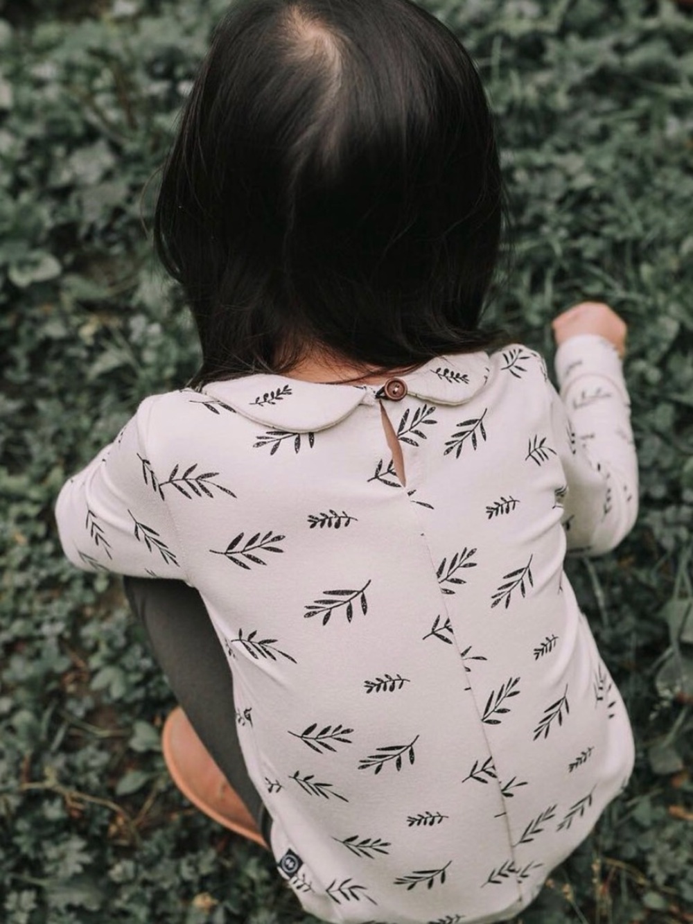 Girls' Cream Long-Sleeve Top with Black Leaf Print
